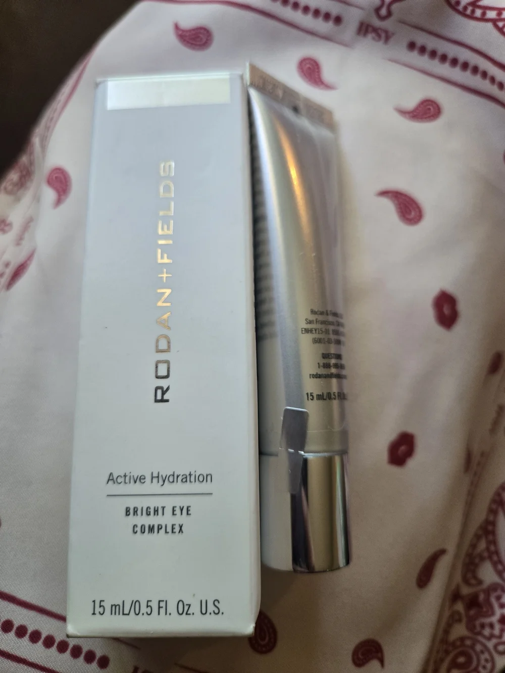 Rodan + Fields Bright Eye Complex in Silver Tube and White Box